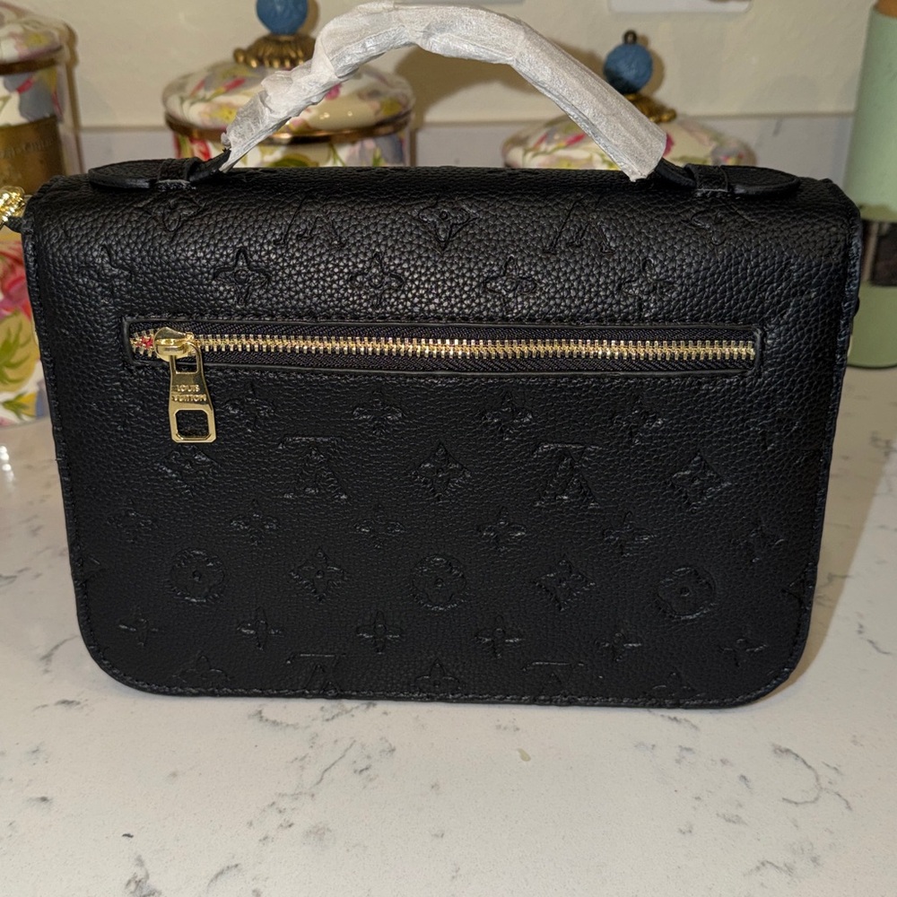 Louis Vuitton Black Embossed Monogram Satchel with Gold-Tone Lock - Picture 3 of 10